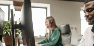 The Key Features of the Best Online Real Estate Schools in California Man in white long sleeve shirt using a computer