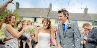 Top 10 Unique Wedding Entertainment Ideas for 2024 Woman in white wedding dress standing beside man in black suit