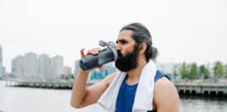 6 Things That Surprised Me About Owning a Hydrogen Water Machine Man drinking Water after workout