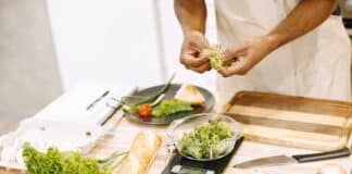 Healthy Eating – 5 Secrets To Cleaner, Non-Toxic Cooking Person Holding Green Vegetables