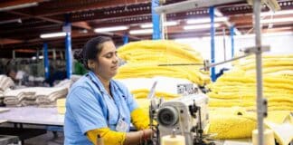 Common Mistakes Most Sewers Make Before They Even Thread a Needle Textile Factory Worker Operating Sewing Machine