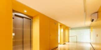 6 Access Solutions That Keep Workers Safe Without Slowing the Job Down Silver elevator in building